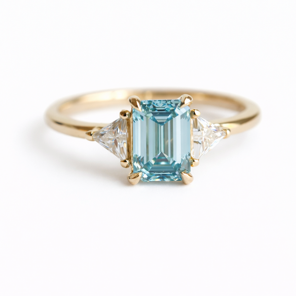 Alexis | 1 ct. Emerald Cut Blue Diamond Three-Stone Ring