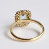 Emma | 1 ct. Emerald Cut Sky Blue Topaz Halo Ring