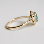 Emma | Heart Cut Sky Blue Topaz Halo Ring