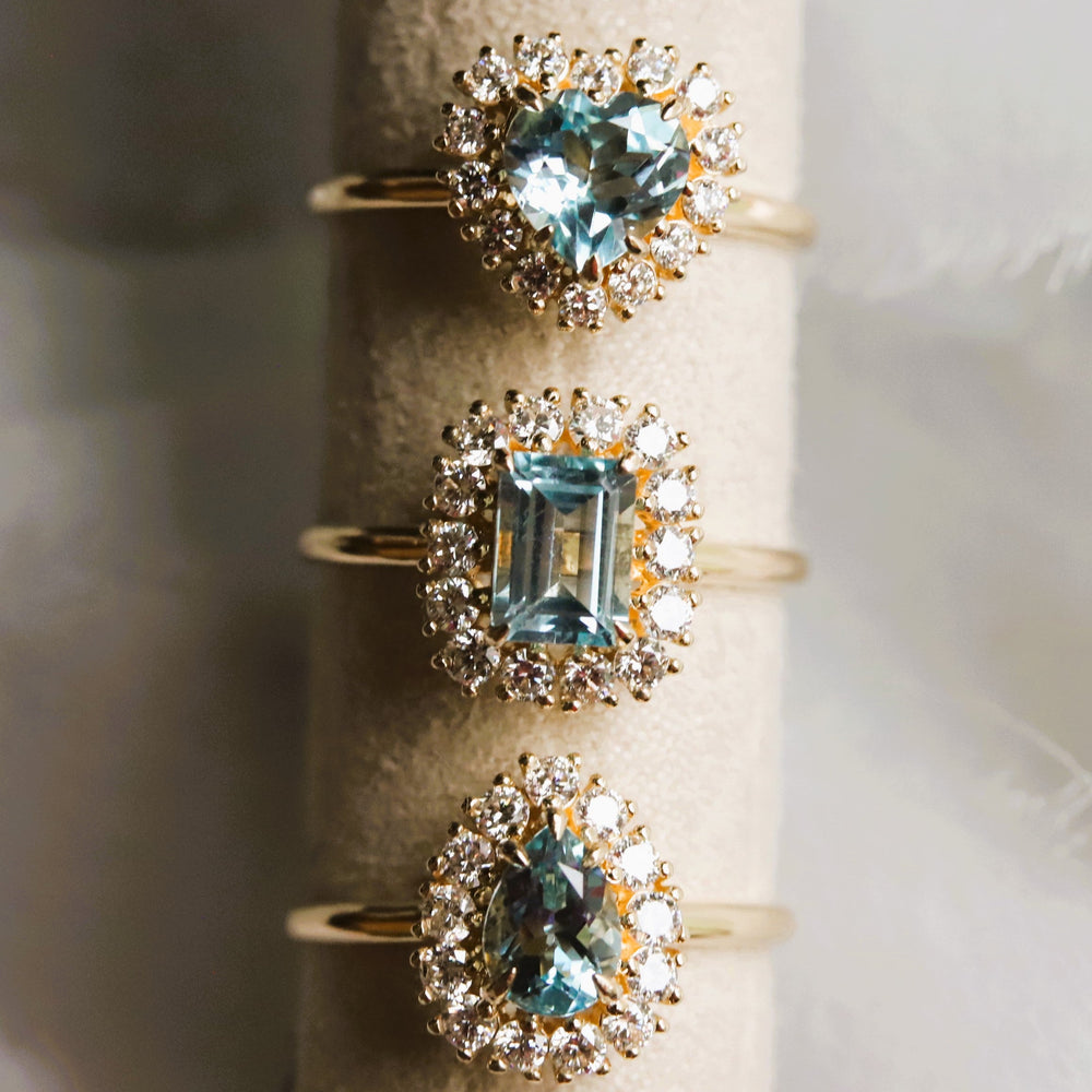 Emma | Heart Cut Sky Blue Topaz Halo Ring