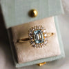 Emma | 1 ct. Emerald Cut Sky Blue Topaz Halo Ring