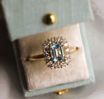 Emma | 1 ct. Emerald Cut Sky Blue Topaz Halo Ring