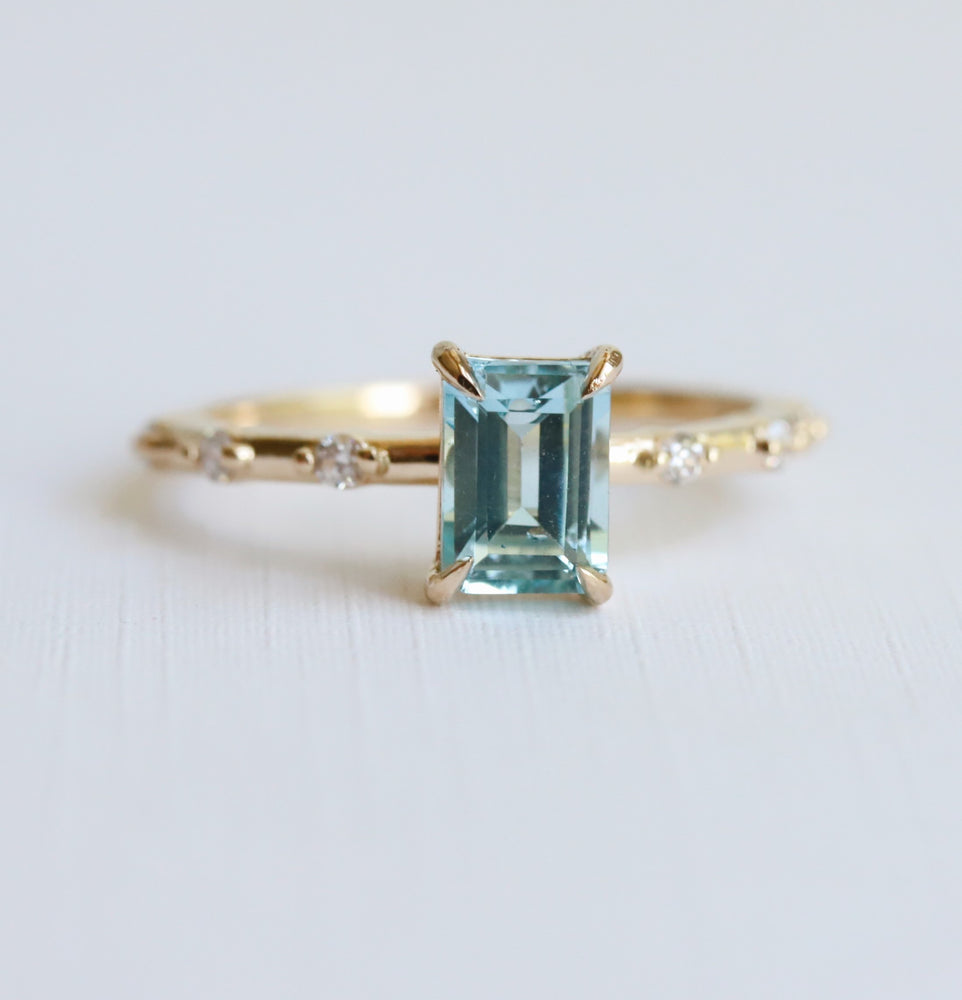 Aurora | 1 ct. Emerald Cut Sky Blue Topaz Accented Ring
