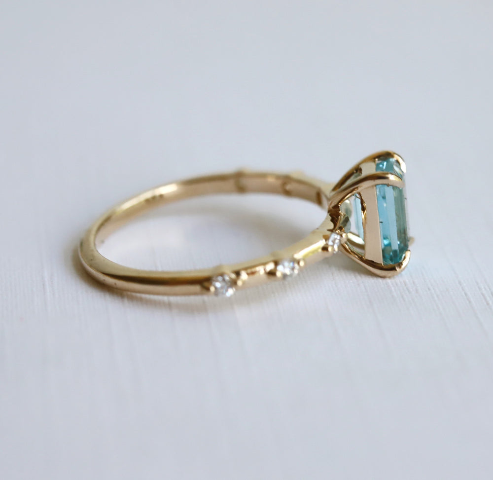 Aurora | 1 ct. Emerald Cut Sky Blue Topaz Accented Ring