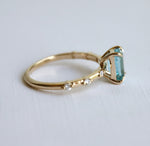 Aurora | 1 ct. Emerald Cut Sky Blue Topaz Accented Ring