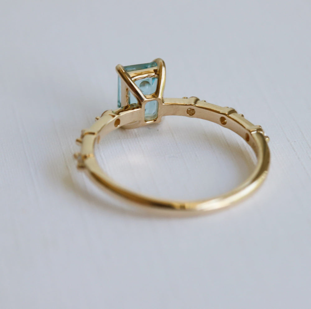 Aurora | 1 ct. Emerald Cut Sky Blue Topaz Accented Ring