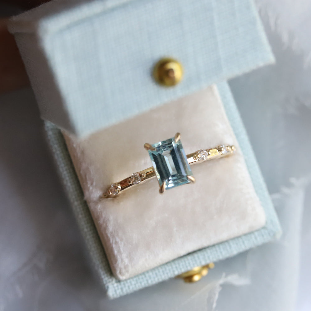 Aurora | 1 ct. Emerald Cut Sky Blue Topaz Accented Ring