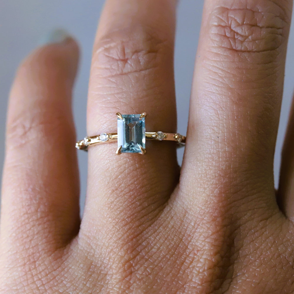 Aurora | 1 ct. Emerald Cut Sky Blue Topaz Accented Ring