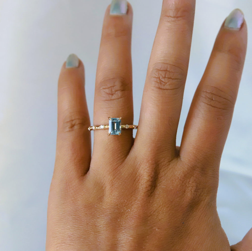 Aurora | 1 ct. Emerald Cut Sky Blue Topaz Accented Ring