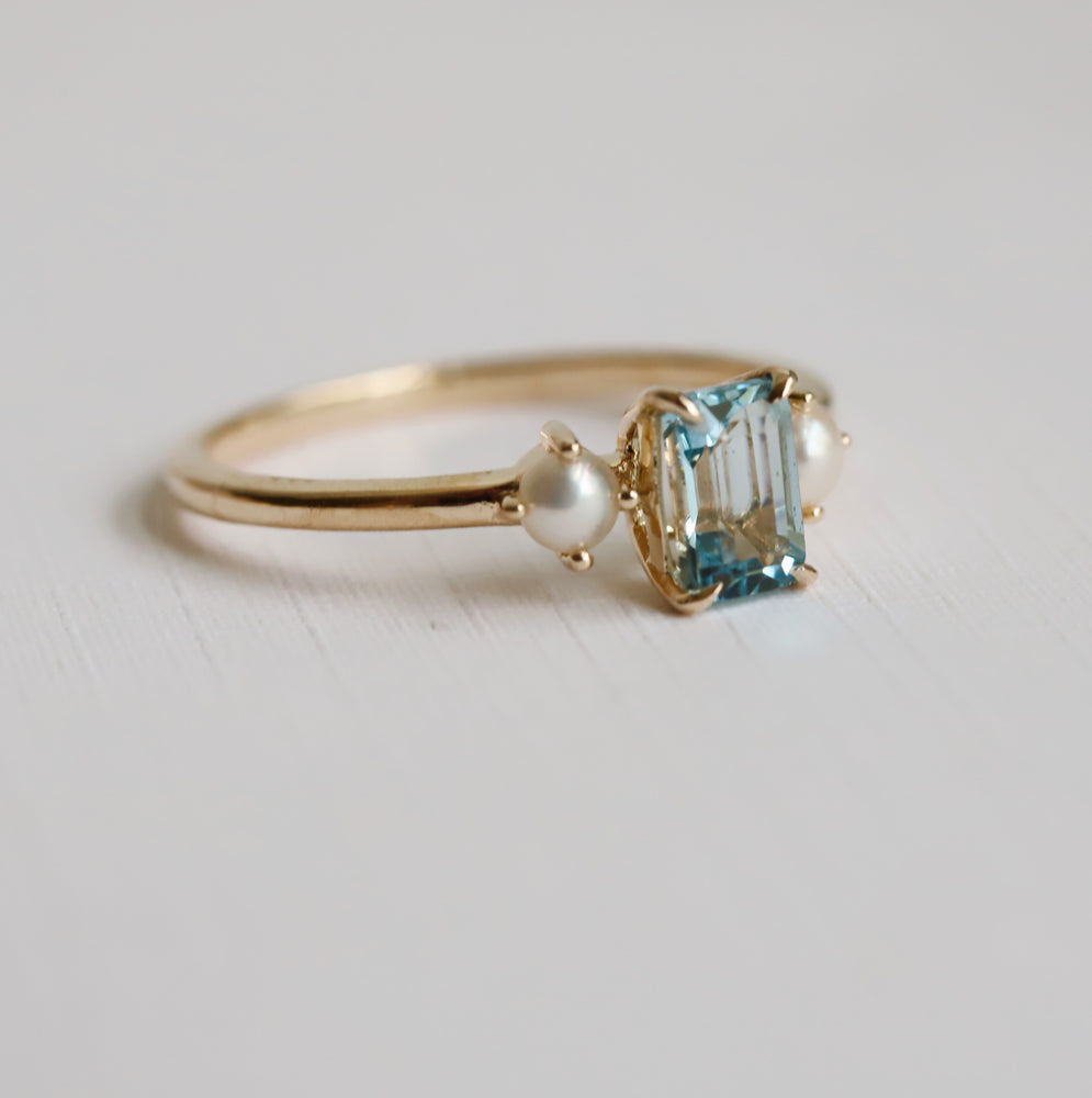 EVA | 0.7 ct. Emerald Cut Aquamarine and Pearl Side Stone Ring