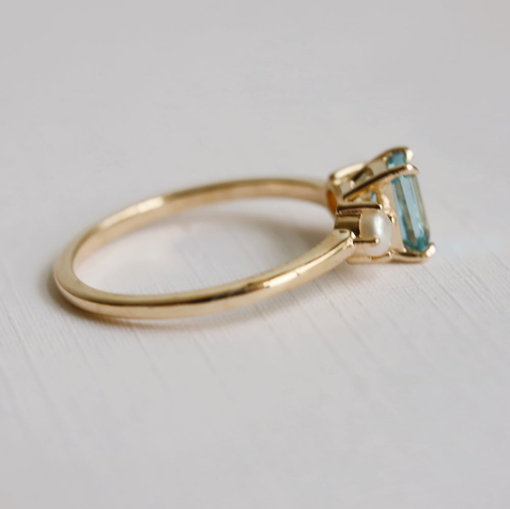 EVA | 0.7 ct. Emerald Cut Aquamarine and Pearl Side Stone Ring