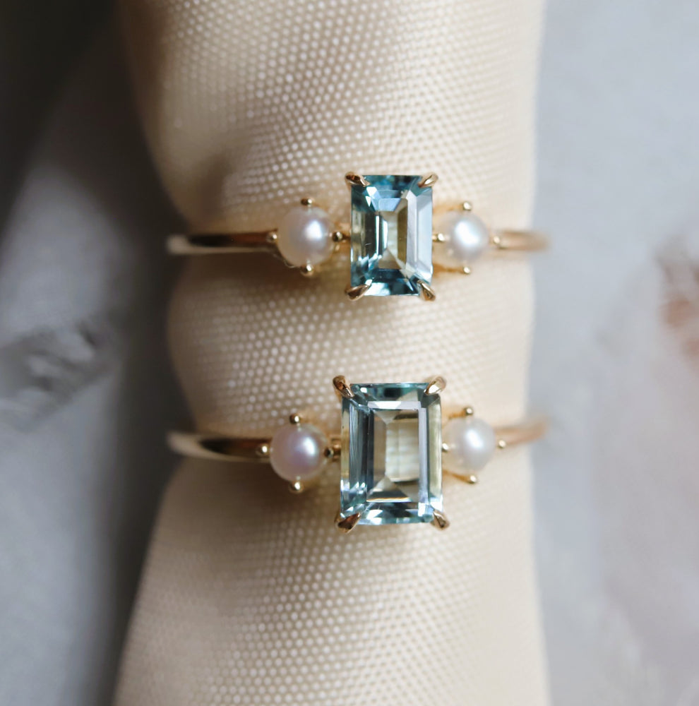 EVA | 0.7 ct. Emerald Cut Aquamarine and Pearl Side Stone Ring