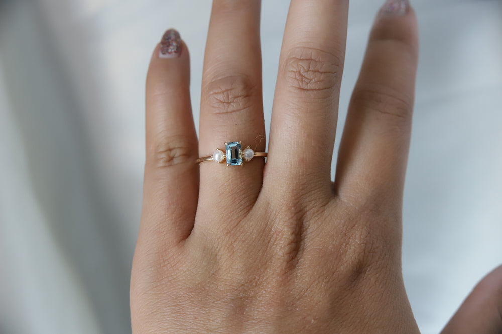 EVA | 0.7 ct. Emerald Cut Aquamarine and Pearl Side Stone Ring
