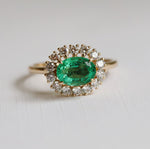 Emma | 1 ct. Oval Emerald East West Halo Ring