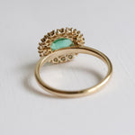 Emma | 1 ct. Oval Emerald East West Halo Ring