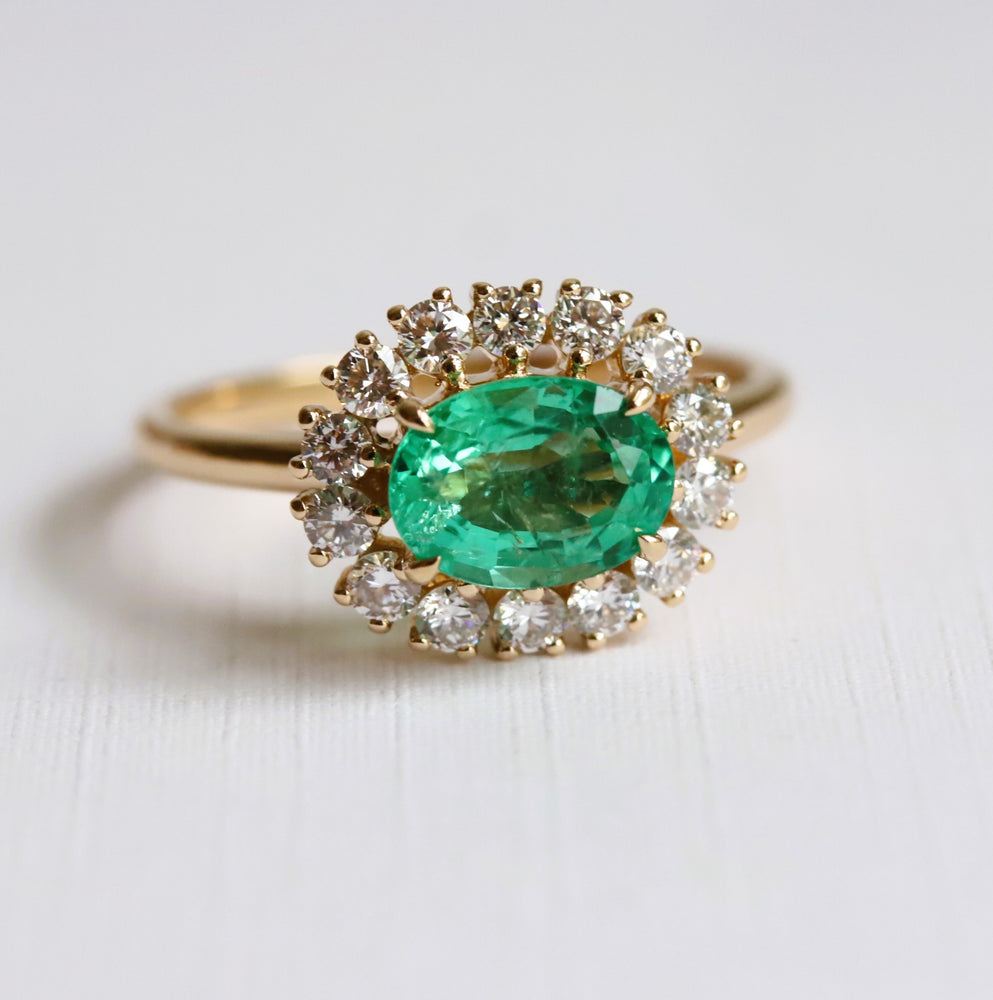 Emma | 1 ct. Oval Emerald East West Halo Ring