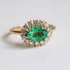 Emma | 1 ct. Oval Emerald East West Halo Ring