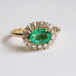 Emma | 1 ct. Oval Emerald East West Halo Ring