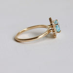 Emma | 1 ct. Emerald Cut Sky Blue Topaz East West Halo Ring