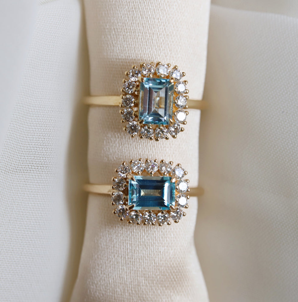 Emma | 1 ct. Emerald Cut Sky Blue Topaz East West Halo Ring