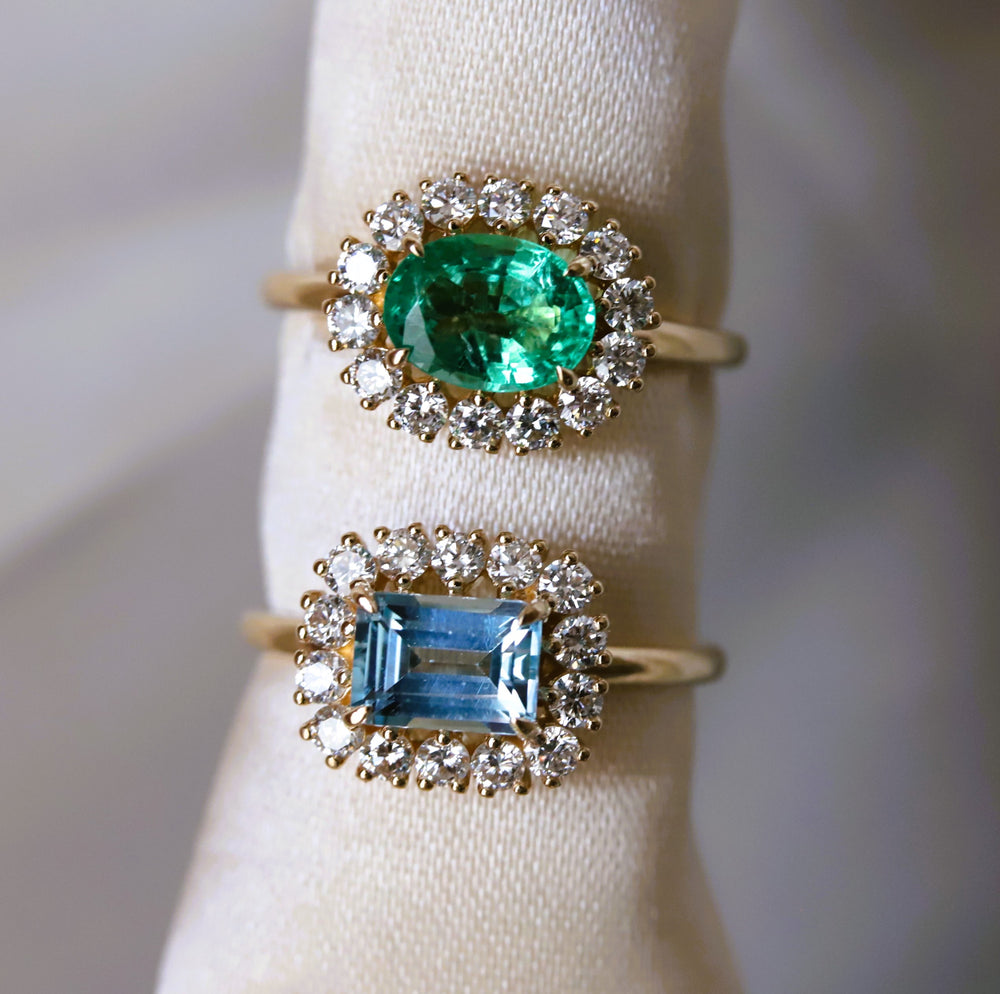 Emma | 1 ct. Emerald Cut Sky Blue Topaz East West Halo Ring