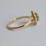 Emma | 1 ct. Oval Peridot East West Halo Ring