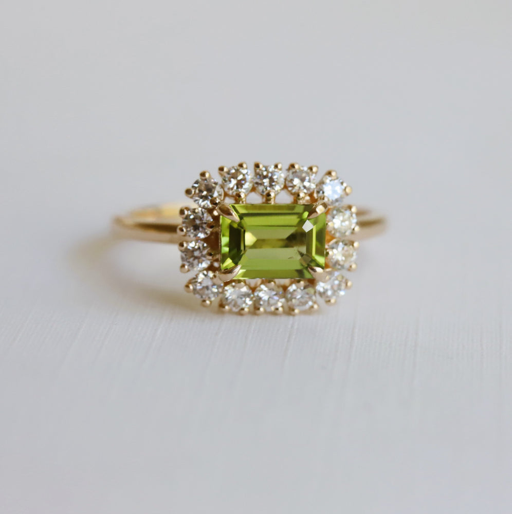 Emma | 1 ct. Emerald Cut Peridot East West Halo Ring