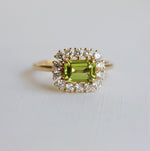Emma | 1 ct. Emerald Cut Peridot East West Halo Ring