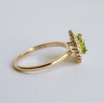 Emma | 1 ct. Emerald Cut Peridot East West Halo Ring