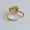 Emma | 1 ct. Emerald Cut Peridot East West Halo Ring