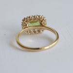 Emma | 1 ct. Emerald Cut Peridot East West Halo Ring