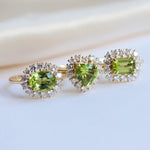 Emma | 1 ct. Oval Peridot East West Halo Ring