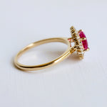 Emma | 1 ct. Oval Pink Sapphire East West Halo Ring