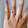 Emma | 1 ct. Oval Pink Sapphire East West Halo Ring
