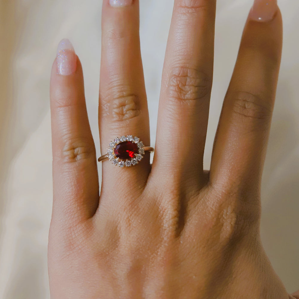 Emma | 1 ct. Oval Ruby East West Halo Ring