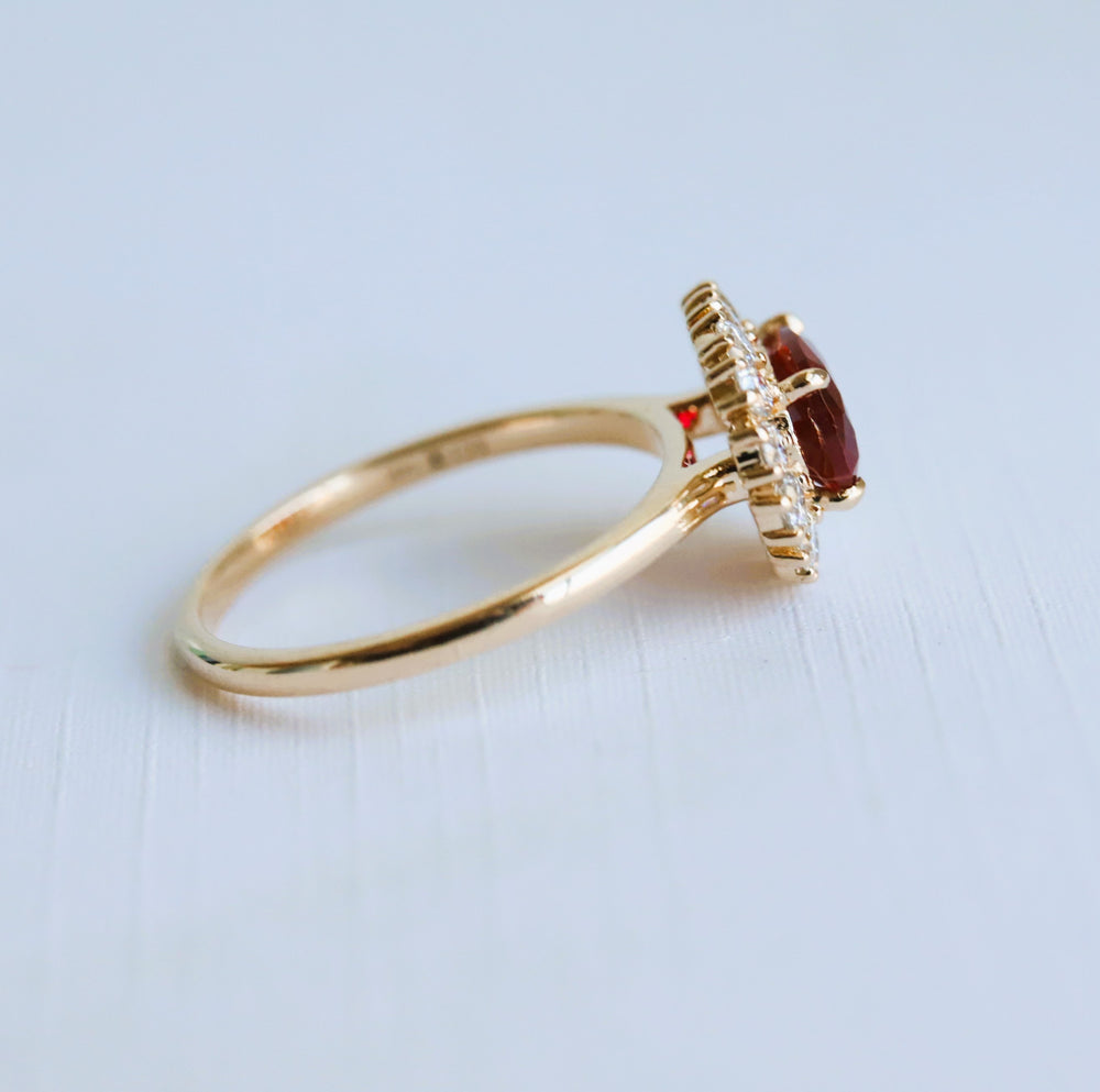 Emma | 1 ct. Oval Ruby East West Halo Ring