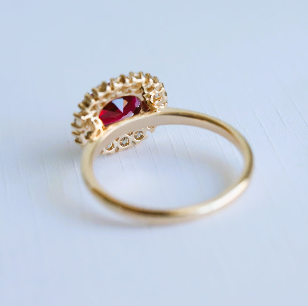 Emma | 1 ct. Oval Ruby East West Halo Ring