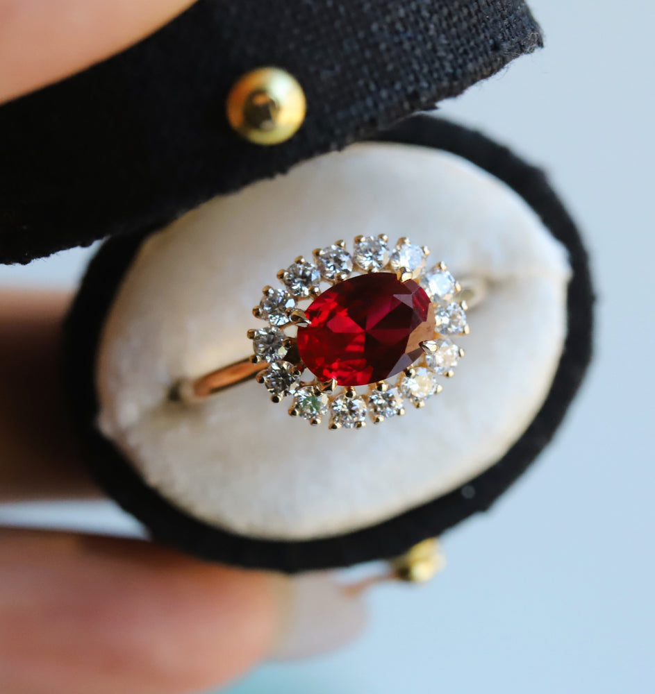 Emma | 1 ct. Oval Ruby East West Halo Ring
