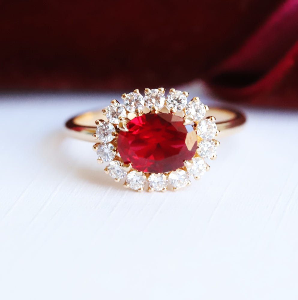 Emma | 1 ct. Oval Ruby East West Halo Ring