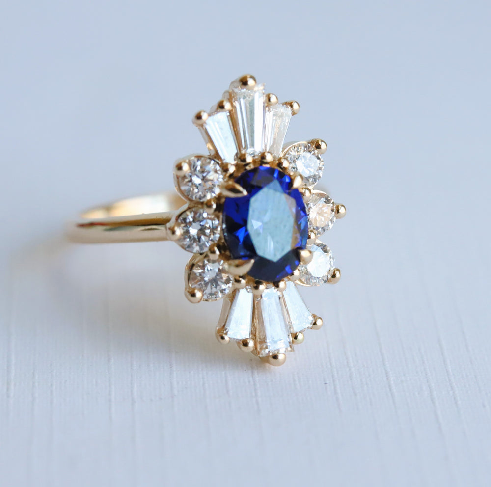 Decora | Oval Lab Created Blue Sapphire Halo Ring