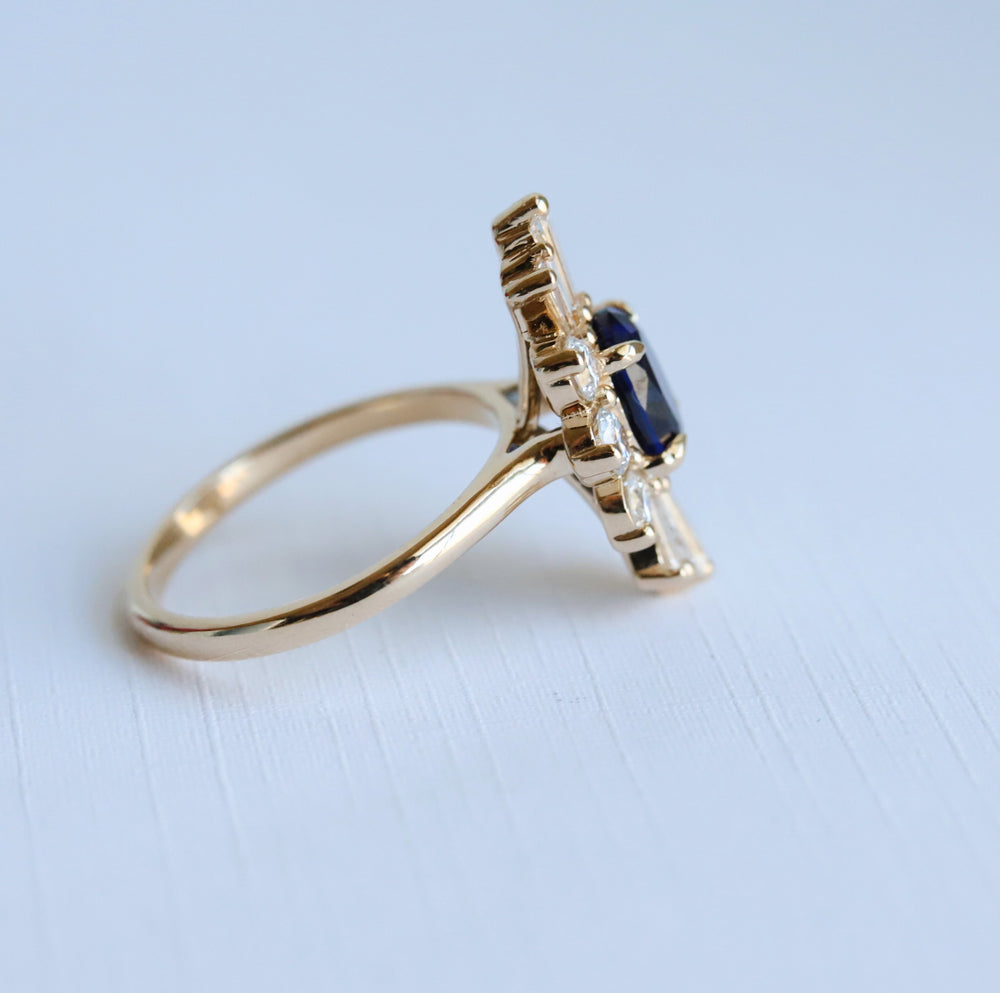 Decora | Oval Lab Created Blue Sapphire Halo Ring