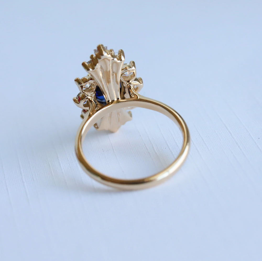 Decora | Oval Lab Created Blue Sapphire Halo Ring