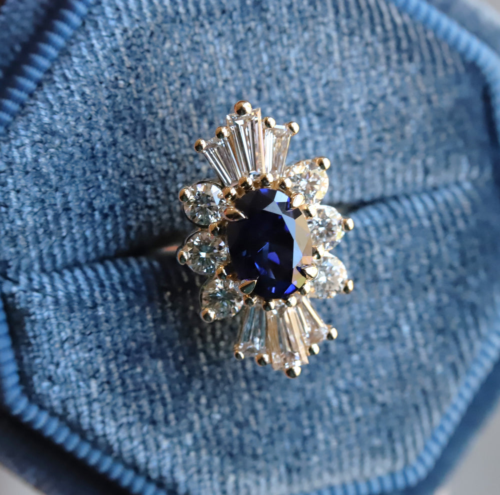 Decora | Oval Lab Created Blue Sapphire Halo Ring