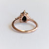 Alexis | 1 ct. Pear Black Onyx & Triangle Moissanite Side Stone Ring