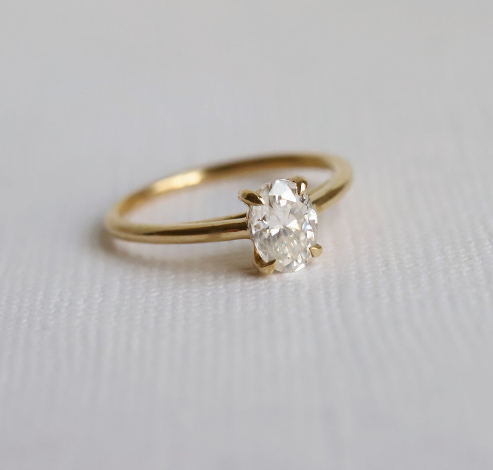 AVA | 0.8 ct Oval Dainty Cathedral Solitaire Ring