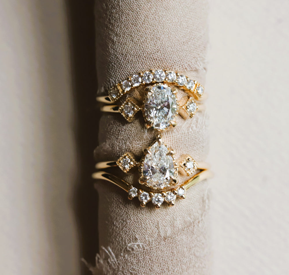 Cara | 0.7 ct. Oval Diamond Triple Station Ring
