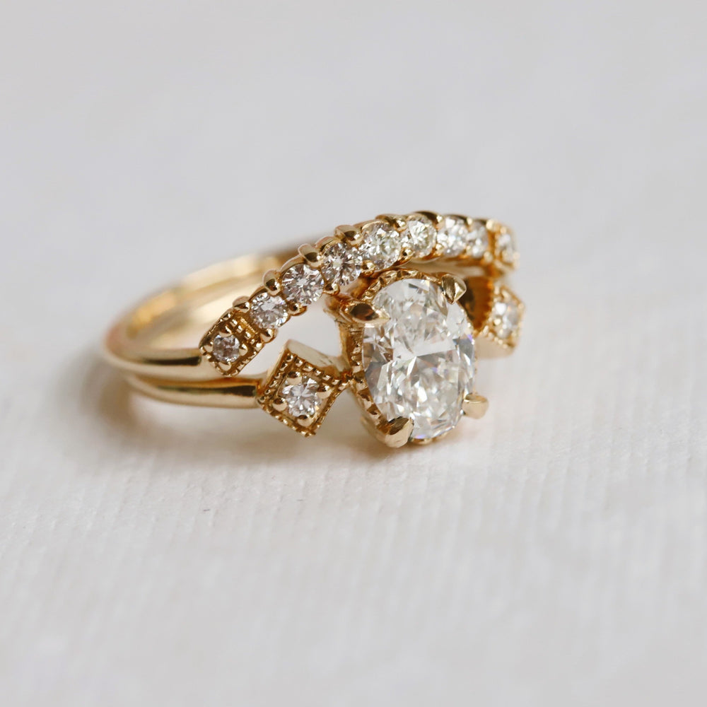 Cara | 0.7 ct. Oval Diamond Triple Station Ring