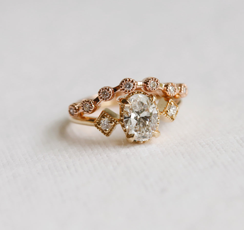 Cara | 0.7 ct. Oval Diamond Triple Station Ring