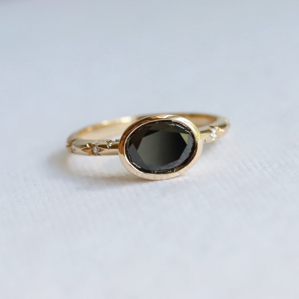 Stella | Oval 1 ct. Black Diamond Bezel Set Starburst East-West Ring