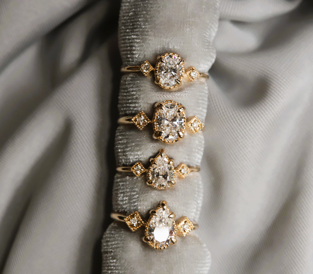 Cara | 0.7 ct. Oval Diamond Triple Station Ring